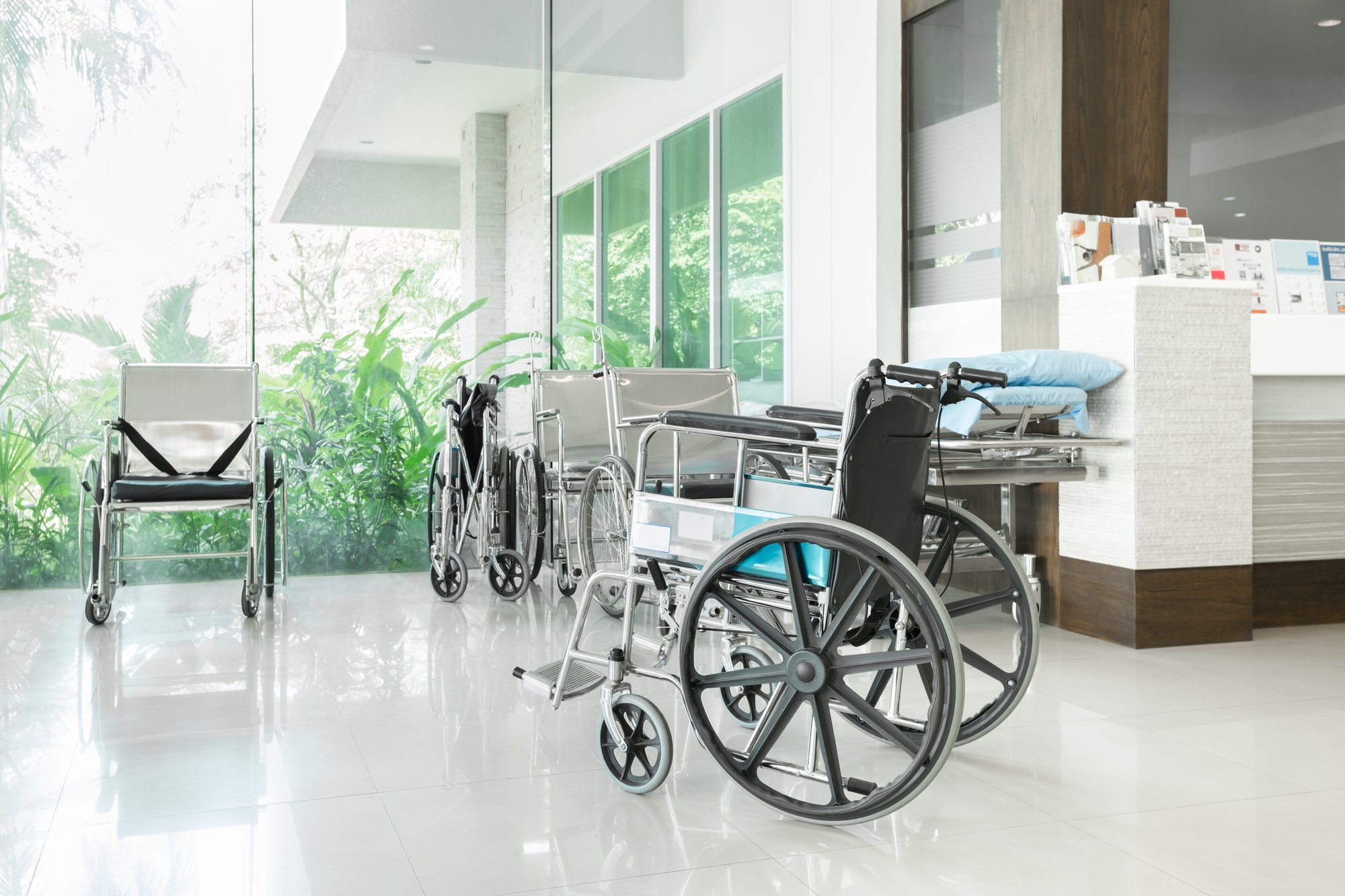 empty-wheelchair-parked-hospital-hallway